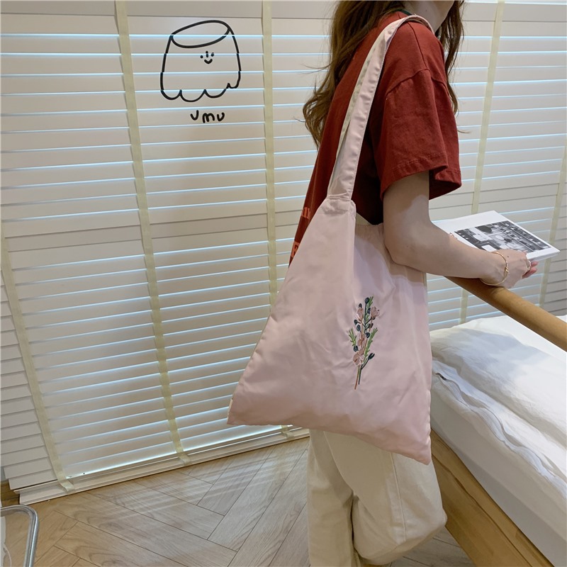 Túi xách vải canvas sử dụng 2 mặt là một chiếc túi đa-zi-năng