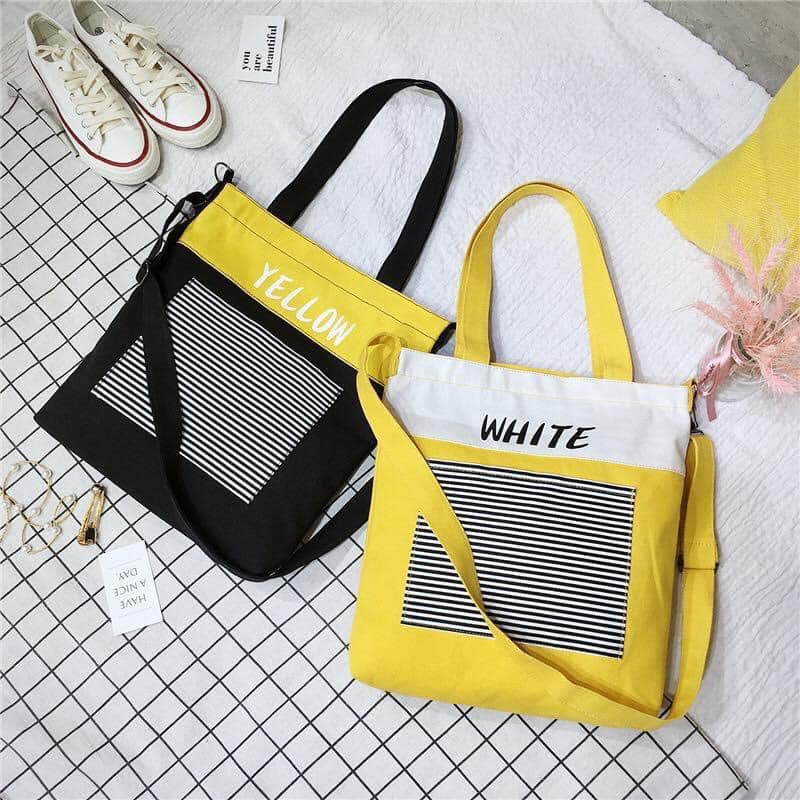 Túi xách canvas kẻ sọc đang tạo lên cơn sốt trong lĩnh vực thời trang phụ kiện được nhiều bạn trẻ yêu thích
